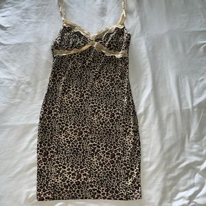Cheetah print dress size:s fits nicely on body worn maybe 3 times. good length